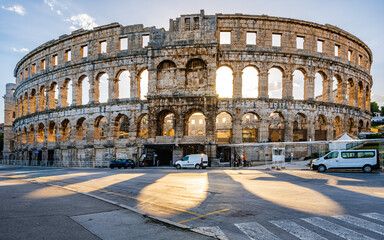 The Roman Amphitheatre in Pula (Pula Arena) in Istria region of Croatia early in morning sunrise...