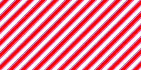 Red and white striped background. A bold diagonal stripe pattern featuring red, pink, and white lines, creating a vibrant and dynamic abstract background perfect for modern design projects.