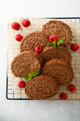 Dark chocolate swiss roll with raspberry
