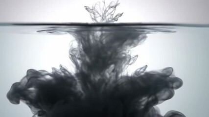 Ultra slow motion shot of a single dark pigment droplet hitting clear water and smoothly dissolving into a blank and translucent void representing memory fading disappear, art, transience