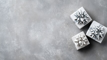 E-commerce ready holiday gifts flat lay with white and silver bows for product placement, minimalist design, festive branding, gift guide editorial, and seasonal marketing

