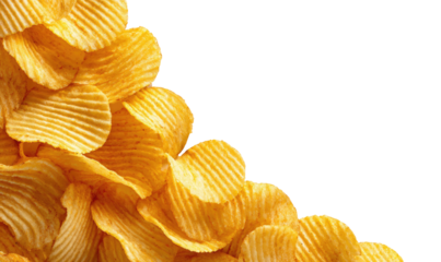 Ridged chips cascade against dark, empty corner