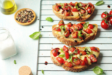 Freshly made bruschetta sandwiches - traditional dish of Italian cuisine