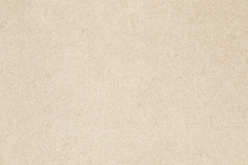 Rough kraft brown paper with visible fibers specks