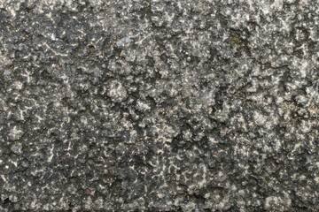 Rough dark gray asphalt or concrete road surface texture background. Grunge stone wall.