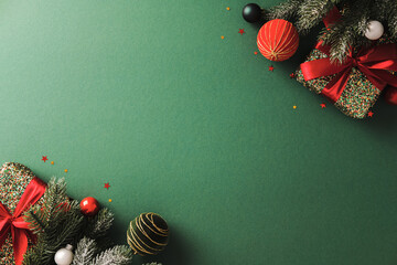 Christmas corner decoration with gifts and ornaments in the top right and bottom left corner