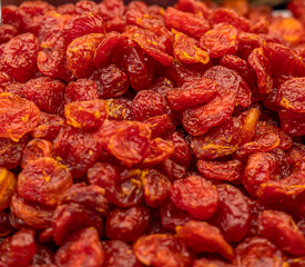Nut snacks sold openly at local market stalls include dried plums, walnuts, and hazelnuts.