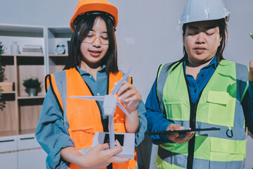 Architects and engineers working collaboratively on construction project