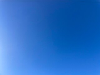 Obraz premium Raw unedited Spanish Iberian clear sky with beautiful light blue gradient. Morning 9am bright sunlight in Autumn. Natural, artistic, artsy and trendy sky blue background template layer. Relaxing, calm