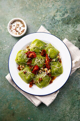 Spinach ravioli with sun dried tomatoes