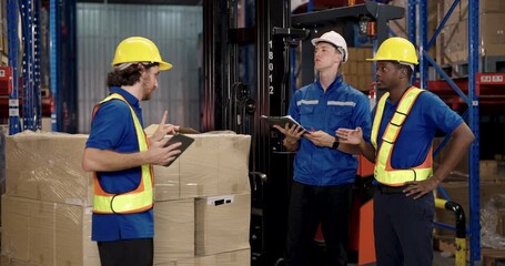 caucasian african american warehouse workers checking pallet cargo using tablet in distribution center logistic environment showing collaboration and stock inspection near forklift and plastic wrap - Powered by Adobe