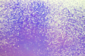 Purple background with soft bokeh lights creating dreamy and elegant atmosphere. Vibrant purple backdrop with shimmering bokeh effects for festive, romantic, holidays concepts.