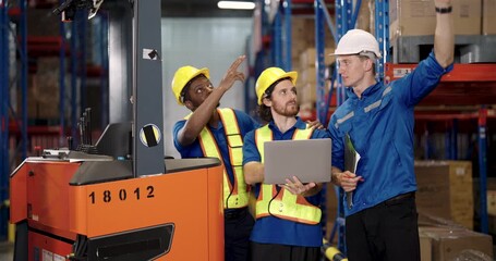 african american male warehouse worker showing frustration resting against forklift during shipment process logistic environment showing real life emotion in industrial stock distribution center