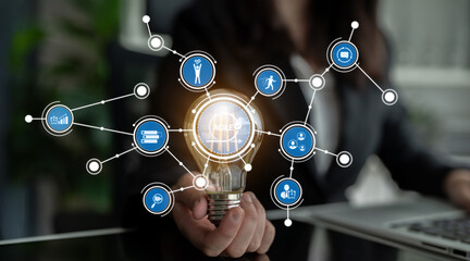 This image illustrates a creative business concept with a light bulb symbolizing innovative ideas connected to various data points, showcasing technology and strategy. Crux