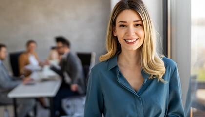 Professional in office environment, highlighting teamwork, collaboration, leadership, and innovation