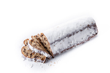 Traditional Christmas Stollen with Raisins and Powdered Sugar isolated on white background