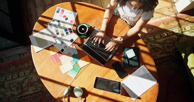 Technology, typing or woman with laptop for home renovation, above or review interior designer info. Paint sample, online decorator search or person with makeover plan, pc or house remodeling service