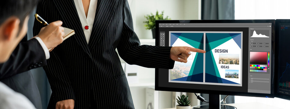 Graphic designer software for modern design of web page and commercial brisk ads showing on the computer screen
