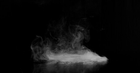 Super Slow Motion of White Rounded Smoke Texture Isolated on Black Background. VFX element for overlay.