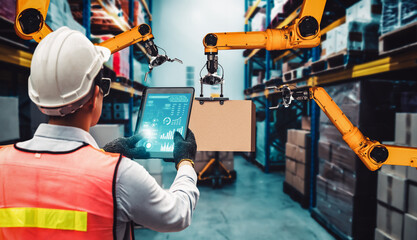 Smart robot arm systems for innovative warehouse and factory digital technology . Automation manufacturing robot controlled by industry engineering using IOT software connected to internet network .