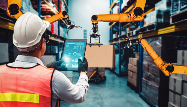 Smart robot arm systems for innovative warehouse and factory digital technology . Automation manufacturing robot controlled by industry engineering using IOT software connected to internet network .