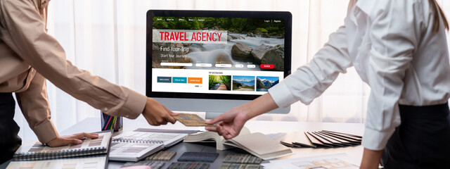 Group of interior architect designer team at table choosing various mood board samples with architecture software on laptop screen. Modern renovation and interior material selection concept. Insight