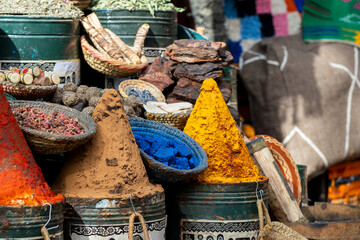 Colourful spices and colourings in a street market - Marrakesh souk, Morocco. Spice stall in Marrakech market, Morocco. 