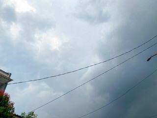 Dark cloud and grey sky background with cloudy before rain storms. bad weather