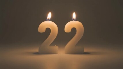 Celebrating 22 Years - Birthday Candles Aglow in Warm Light.