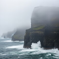 Dramatic Cliffs of Moher in Ireland on a Foggy and Stormy Day.