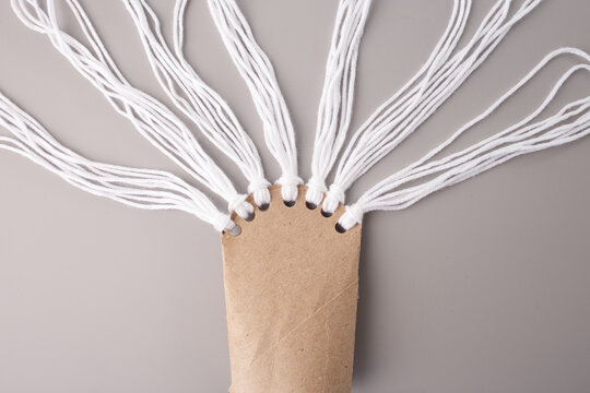 Handmade yarn setup for macrame or weaving project, ideal for craft blogs, DIY tutorials, textile brands, hobby retailers, creative education platforms, slow fashion marketing