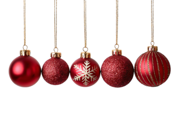 Set of five red Christmas ornament balls hanging on gold strings isolated on white background