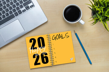 2026 Happy New Year Resolution Goal List and Plans Setting - Business office desk with notebook written about plan listing of new year goals and resolutions setting. Change and glee concept.