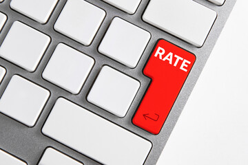 computer keyboard with red rate key