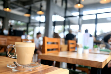 cappuccino, coffee in a clear glass cup in a cafe, soft color background food and drink, hot drink