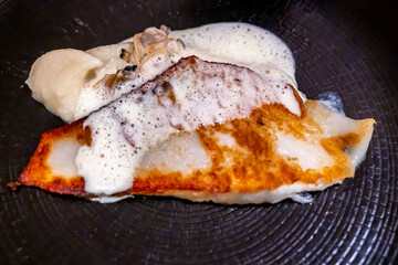 Close-up of Gourmet Fish Fillet with Mussel and Puree. Fine Dining Cuisine.