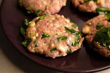cooking raw turkey meatballs in a pan, healthy home meal