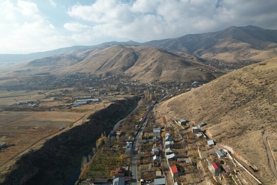 Arzakan, Kotayk Province, Armenia &mdash; aerial view of the village and surrounding mountains. Photo taken on November 18, 2025.