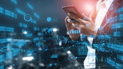 A business professional interacts with a smartphone while surrounded by digital data visualizations. This image captures the essence of modern analytics and technology in a corporate setting. Xenic - Powered by Adobe