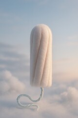 Minimalist white tampon standing vertically on a soft blurred sky background, symbolizing discrete feminine hygiene and clean period protection.
