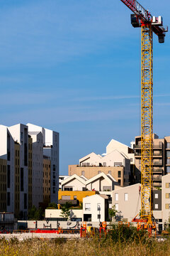 Modern design guiding urban development as construction, architecture and housing evolve with cranes across the Montpellier France building site