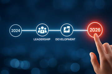 Businessperson touching a glowing circle with the number 2026 symbolizing a strategic roadmap timeline for leadership development and success
