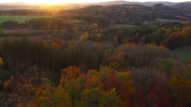 Drone flight over the South Bohemian landscape at the end of October. Colorful harmony of nature in autumn. Czech Republic, Central Europe.