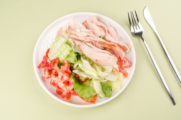 Cherry tomato and turkey salad in white bowl for weight loss, nutrition, and food blog content