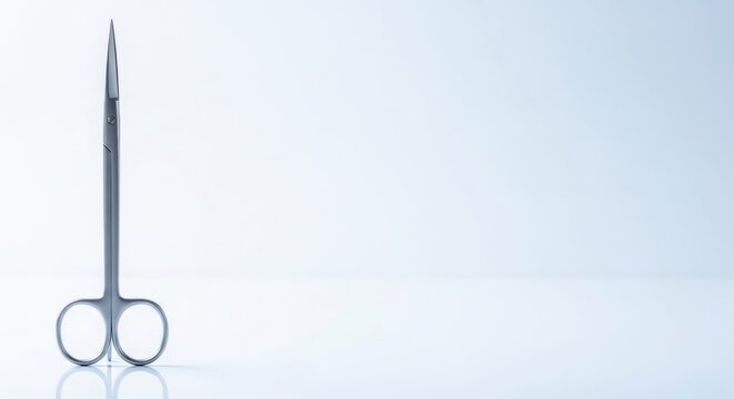 Medical scissor, a sharp metal instrument for surgery, on a clean white background. Concept of healthcare, precision, and medical equipment.