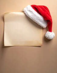 Plantilla para carta a Papa Noel, Santa Claus y reyes Magos, con el gorro rojo y papel pergamino con espacio para texto y diseño de navidad	