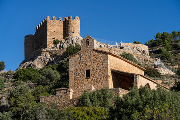 Obraz premium Alcalatén Castle with fortified Hermitage of El Salvador, 10th and 13th centuries, municipality of Alcora, Castellón, Valencian Community, Spain