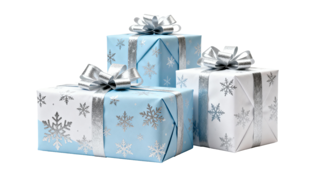 Three beautifully wrapped holiday gifts in blue and white with silver ribbons on a clean background