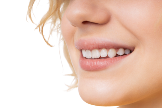 Smiling woman shows her bright white teeth, isolated, PNG