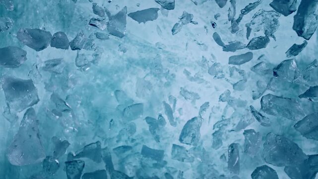 Super Slow Motion of Exploding Ice Shards . Filmed on High Speed Cinema Camera at 1000 FPS
